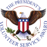 A circular seal showing an eagle and the words The President's Volunteer Service Award